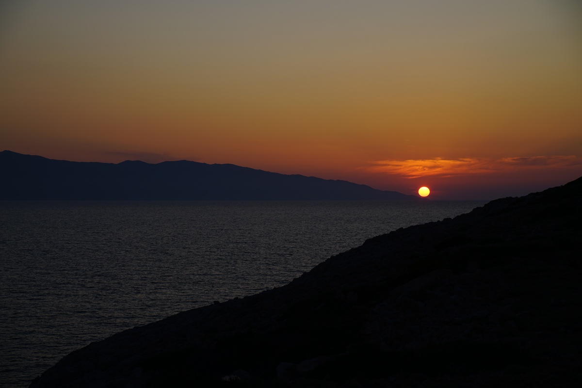 Sonnenuntergang bei Donoúsa, links Náxos